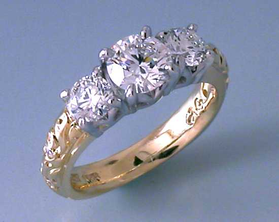 custom-engraved-platinum-3-stone-diamond-engagement-ring.jpg