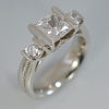 custom-platinum-3-stone-channel-set-diamond-milgrain-shank-engagement-ring.jpg