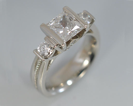 custom-platinum-3-stone-channel-set-diamond-milgrain-shank-engagement-ring.jpg