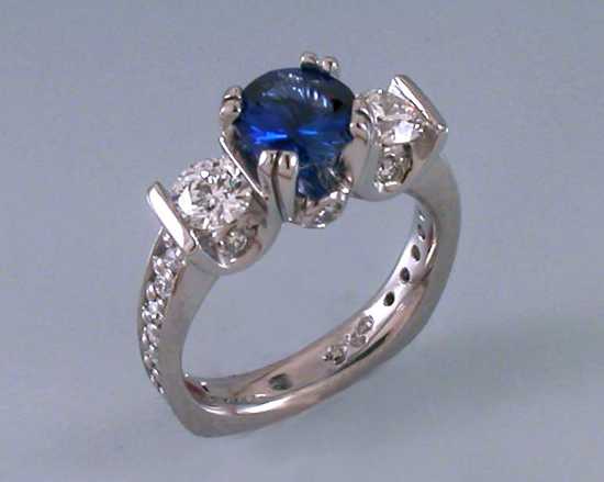 custom-platinum-3-stone-sapphire-and-diamond-engagement-ring-with-diamond-shank.jpg