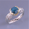 custom-white-and-yellow-gold-sapphire-and-diamond-engagement-ring.jpg