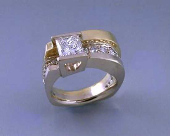 custom contemporary channel set princess diamond engagement ring in white and yellow gold Euro shank