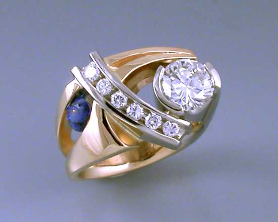 custom contemporary diamond and sapphire engagement ring in white and yellow gold Euro shank