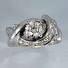 custom contemporary free form diamond engagement ring in white gold split Euro shank