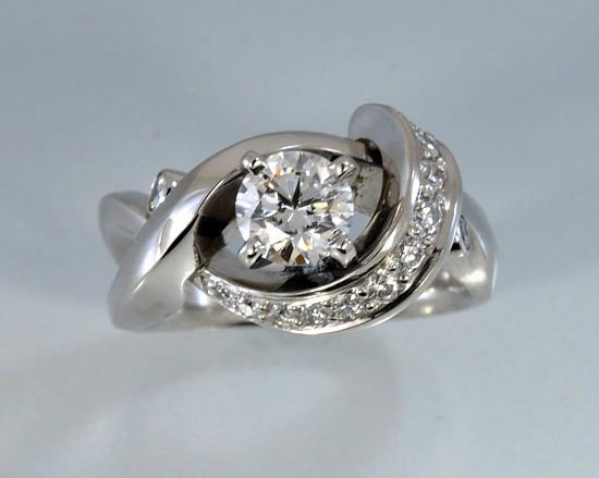 custom contemporary free form diamond engagement ring in white gold split Euro shank