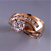 custom WG YG diamond engagement ring with east-west channel-set row of diamonds in a substantial Euro shank