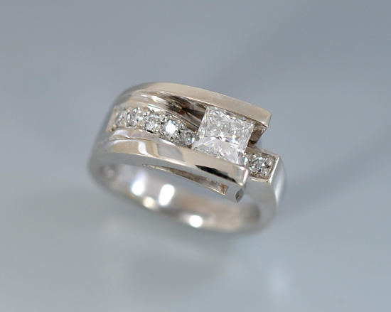 custom contemporary engagement ring channel set princess diamond white gold Euro shank