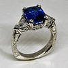 4.6ct Ceylon blue sapphire hand engraved platinum with trillion cut diamonds