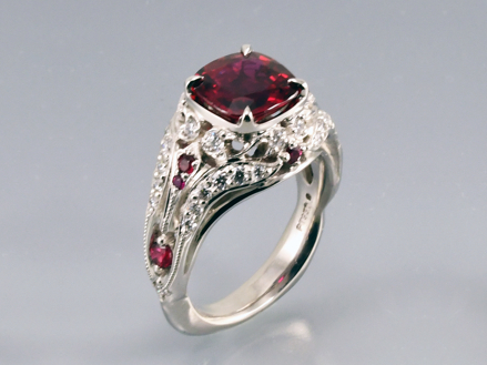 2.5ct “pigeon blood” ruby set in platinum with ideal cut diamonds and rubies