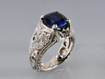 Royal blue 5.2ct sapphire hand engraved platinum with sapphires and diamonds