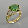 5.1 ct green tourmaline ring with Tsavorite green garnets and diamonds in 18k white and yellow gold