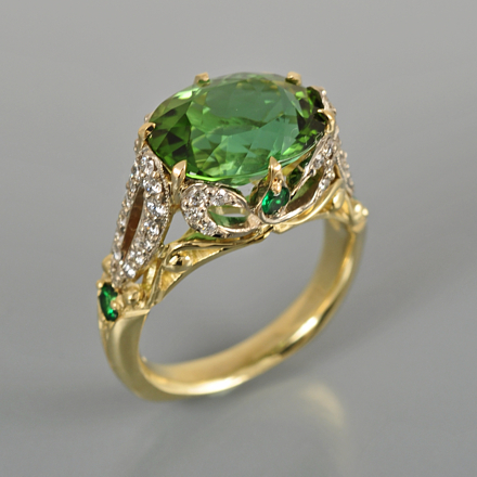 5.1 ct green tourmaline ring with Tsavorite green garnets and diamonds in 18k white and yellow gold