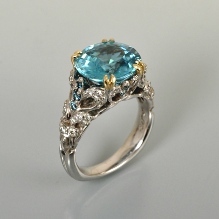 Cambodian blue zircon ring with white and blue diamonds