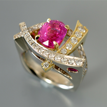Intense pink sapphire ring with diamonds in 18k white and yellow gold