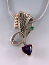 Amethyst and Tsavorite Garnet in silver and 14k yellow gold