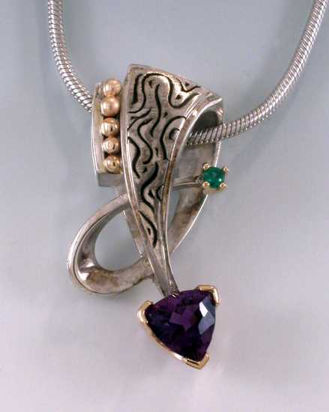 Amethyst and Tsavorite Garnet in silver and 14k yellow gold