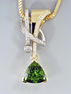 Pakistani 10ct peridot 18k two tone gold with diamonds